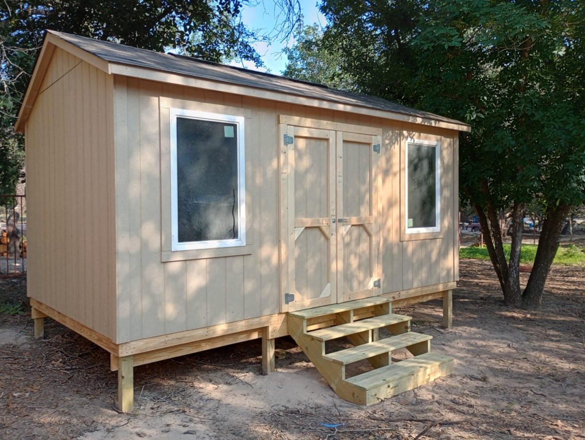 Small wooden cabin with steps