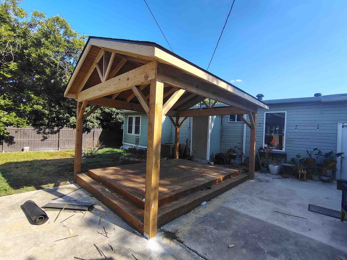 Wooden gazebo under clear blue sky