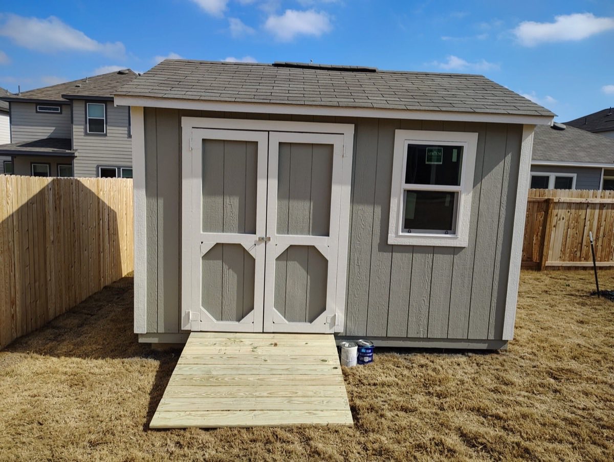 Small shed in a backyard setting