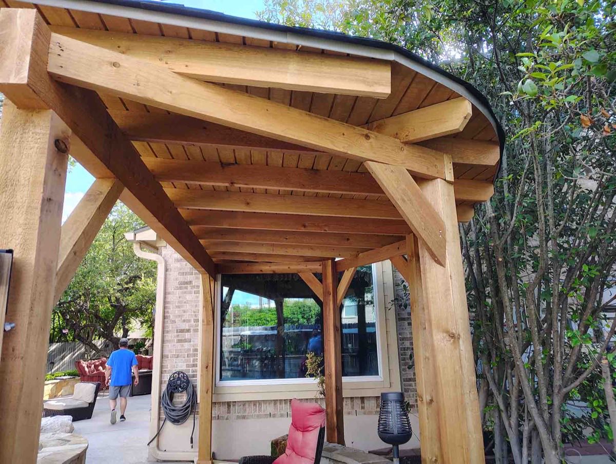 Wooden structure with curved roof