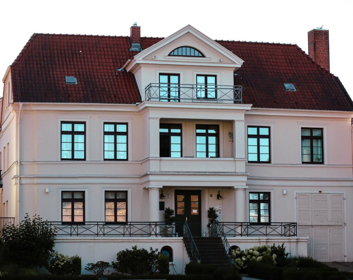 Spanish Colonial mansion with custom windows